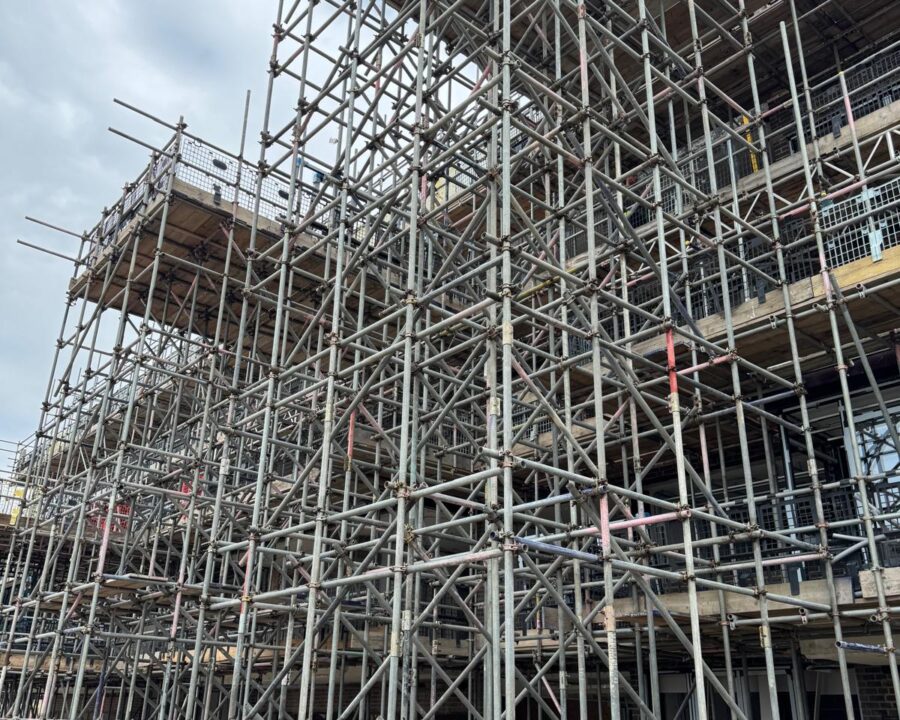 Tube-and-fitting birdcage scaffold with rows of standards, ledgers and bracing