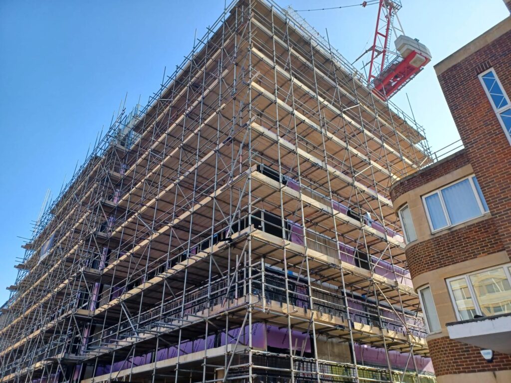 Fully boarded access scaffold around Hendy House in Bournemouth