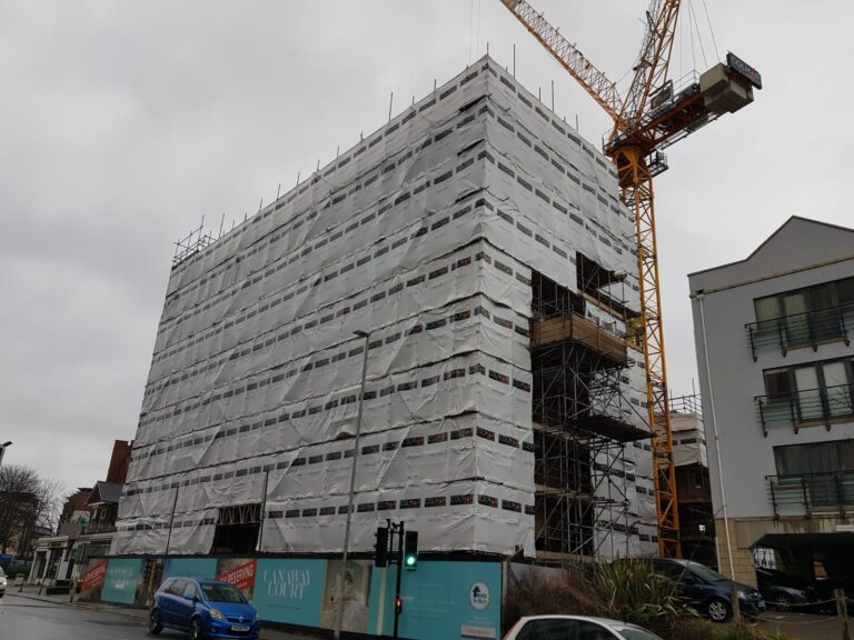 Sheeted access scaffolding around Canaway Court in Poole