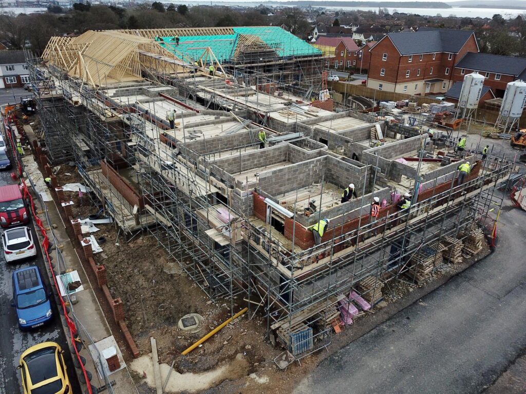 Aerial view of external access scaffolding around the Barchester care-home development in Hamworthy, Poole