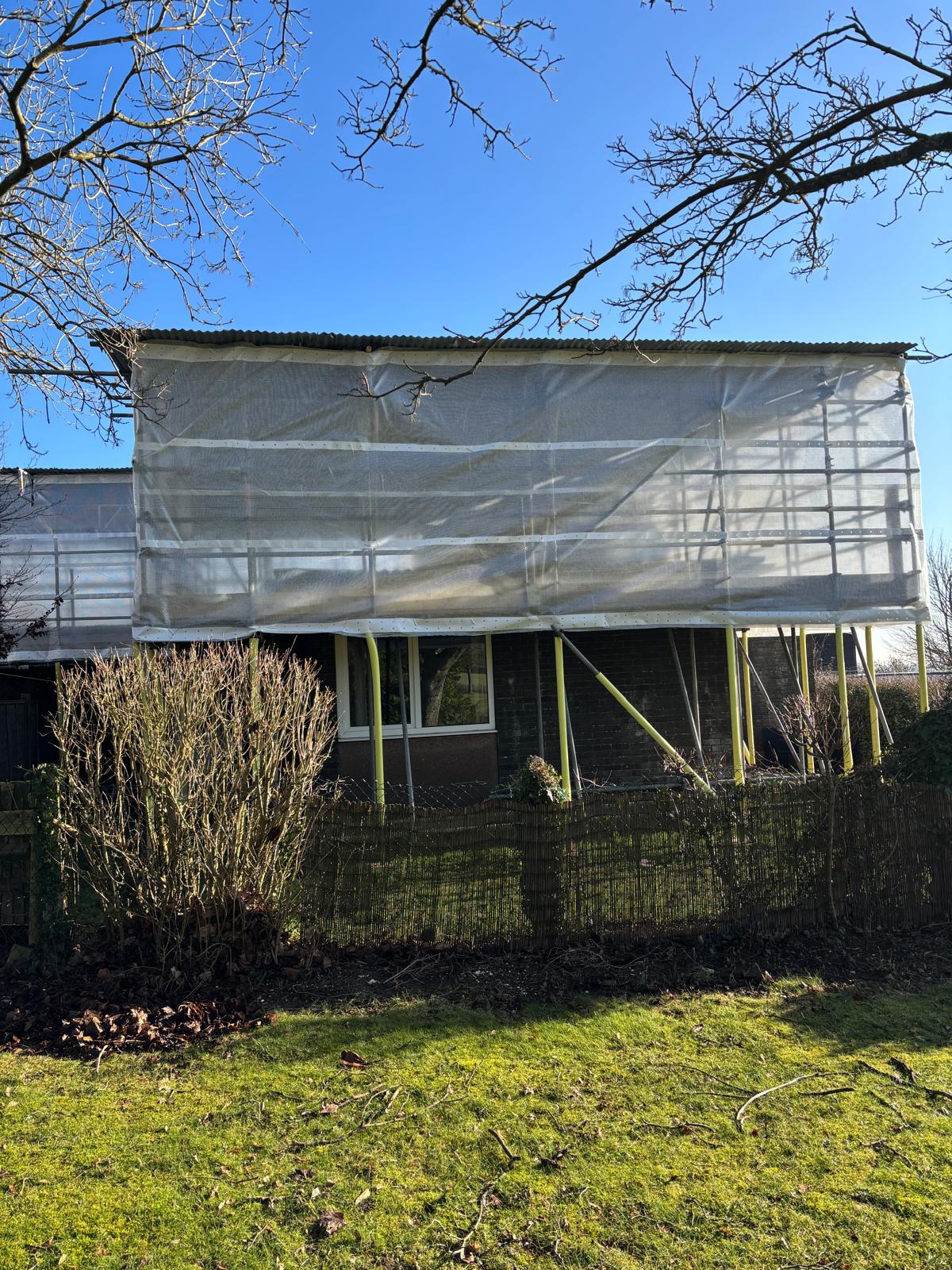 Temporary roof covering and perimeter access scaffolding at MOD Blandford Camp